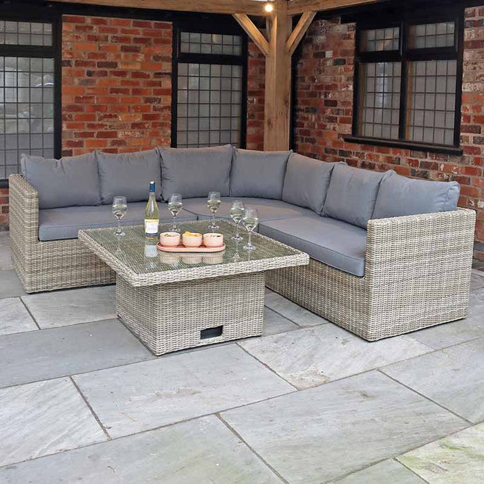 The Wentworth Adjustable Corner Lounge Set arranged in an outdoor space, highlighting the modular design and comfortable seating.