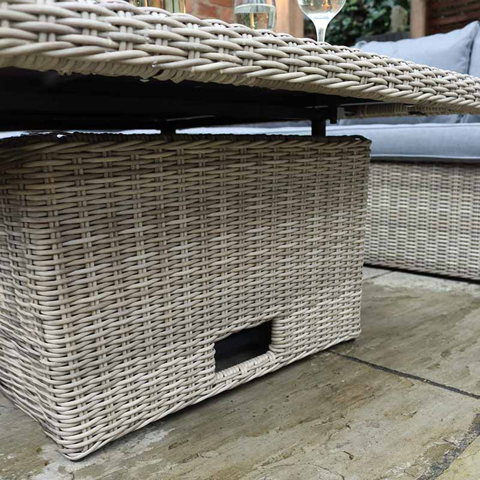 Close-up of the bottom part of the adjustable table, part of the Wentworth Adjustable Corner Lounge Set, showcasing the rattan design.