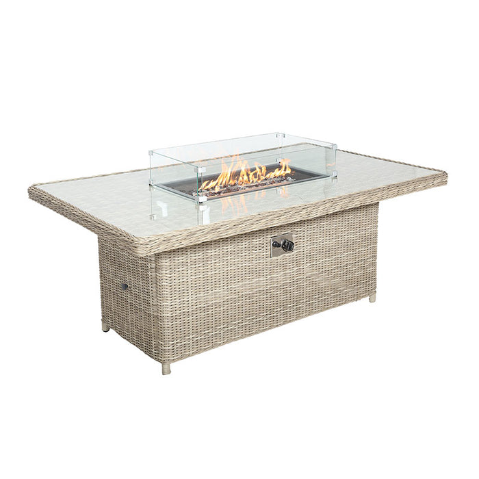 Angled view of the Wentworth rectangular table with the fire pit lit, adding warmth and ambience to outdoor gatherings.