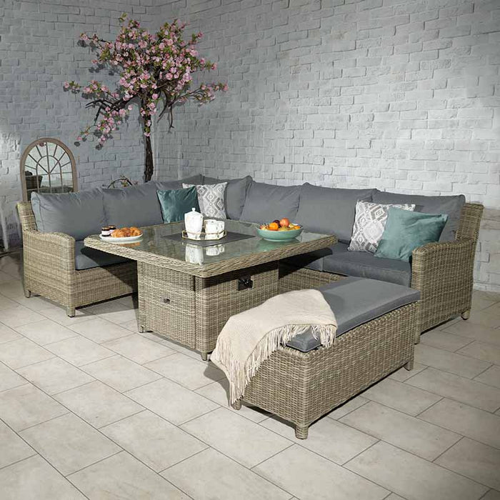 Wentworth Fire Pit Dining & Lounge Set with square table, highlighting the spacious rattan seating area in a tastefully decorated room.